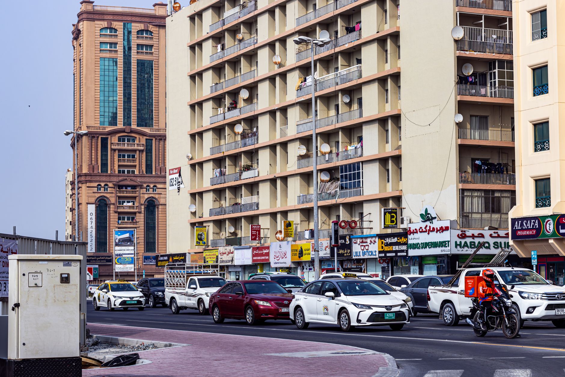 The Faces Behind the Glass: Meet the People Making Dubai's Neighbourhoods Come Alive